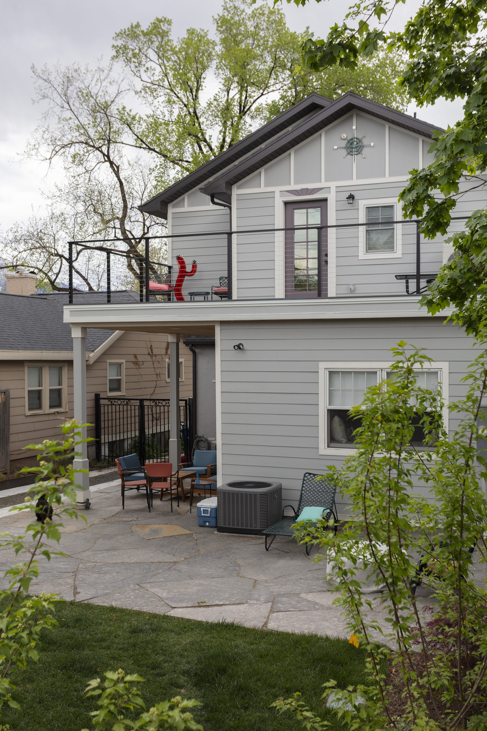 Completed two-story addition with a covered upper deck
